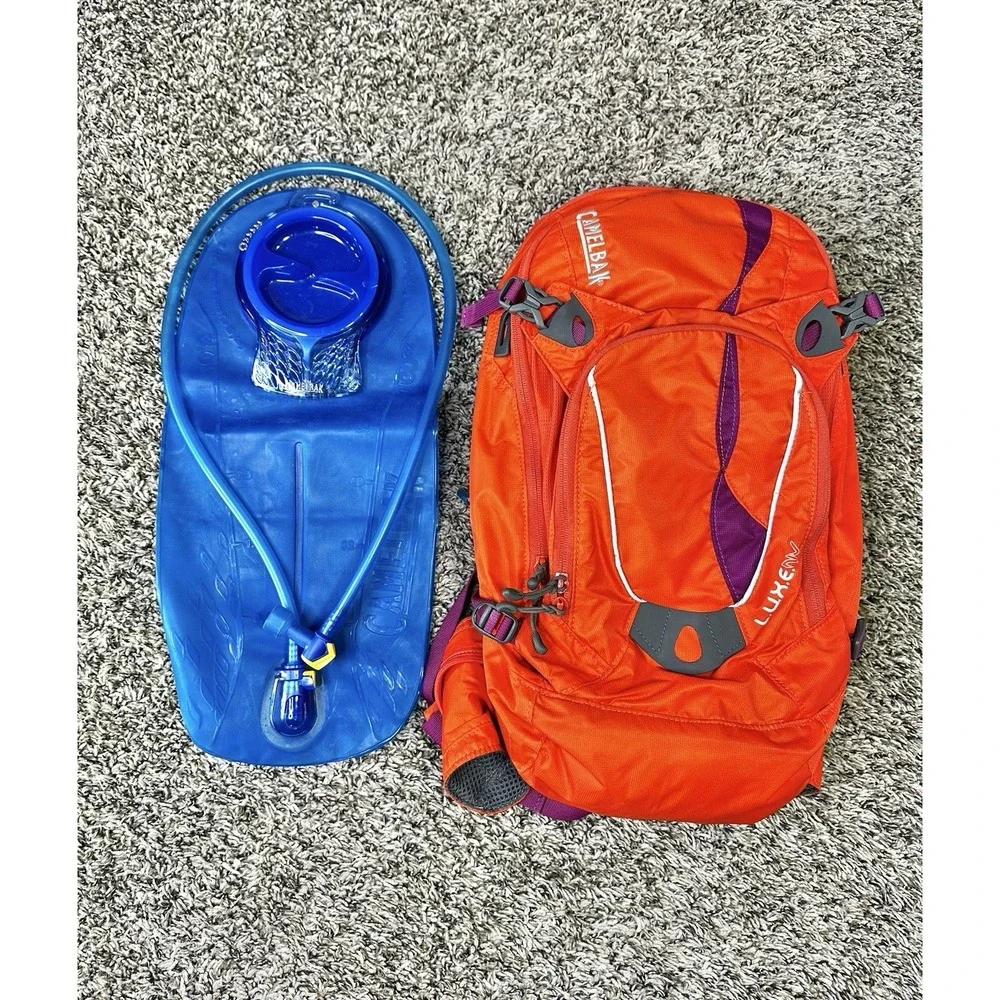 CamelBak L.U.X.E. Hydration Backpack With Bladder Laser Orange